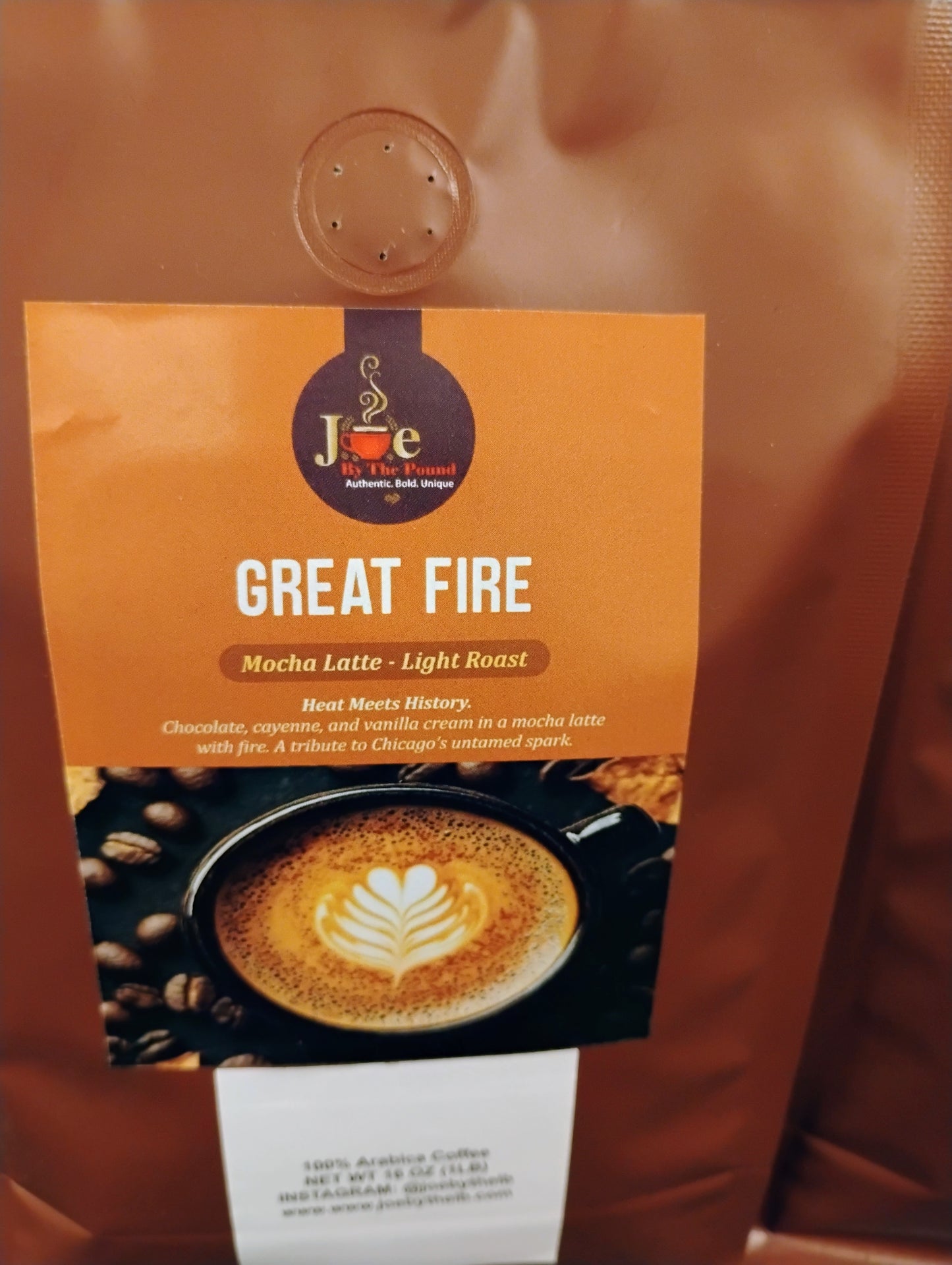 Coffee package labeled 'Great Fire' with a coffee cup and beans design on an orange background.